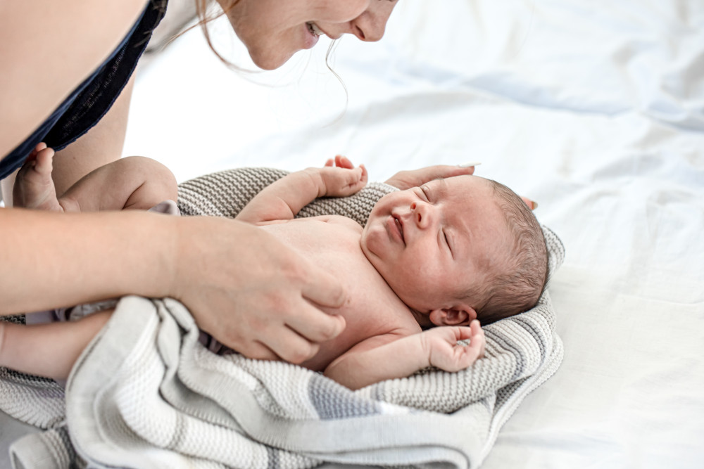 ghs-with-her-newborn-son-home-bedroom_1687170214.jpg